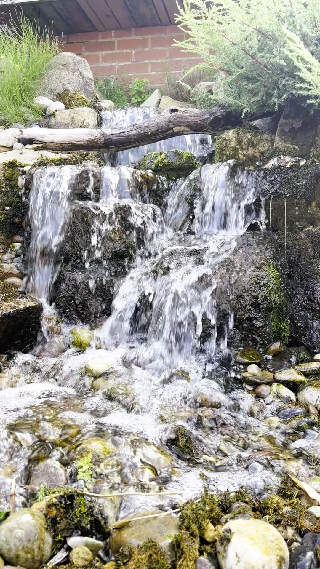 Pondless waterfall helping circulate water in warm weather